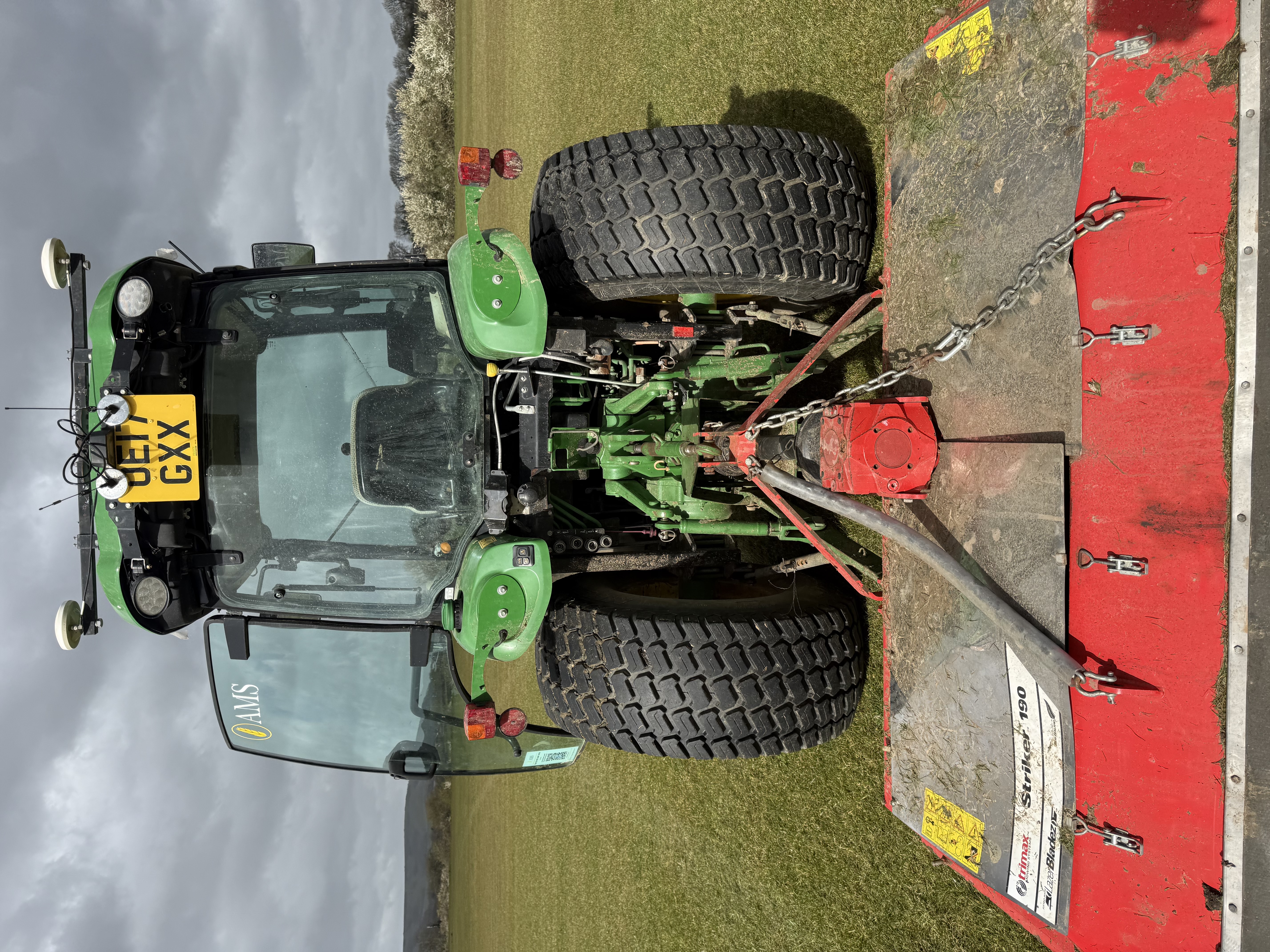 Tractor roller mowing